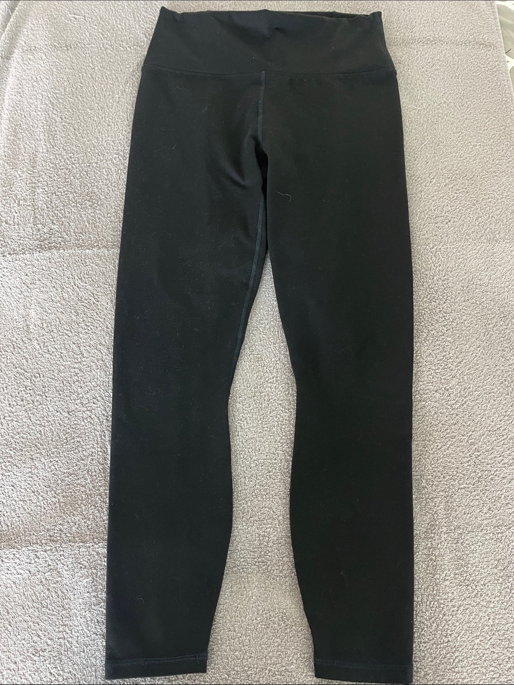Fabletics Black High-Waisted Leggings Crisscross back panel waistband.Length 7/8